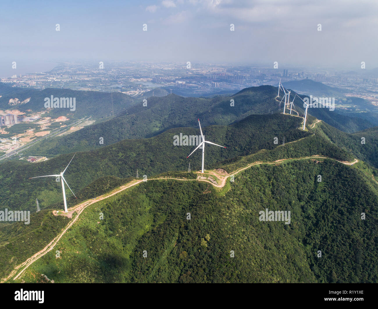 (181115) -- BEIJING, Nov. 15, 2018 (Xinhua) -- Aerial photo taken on Aug. 23, 2018 shows the Bianshan wind farm in Changxing County, east China's Zhejiang Province. According to the National Bureau of Statistics, China's power generation rose 7.2 percent year-on-year in the first 10 months of 2018. In October alone, China generated 533 billion kilowatt-hours (kWh) of power, up 4.8 percent year on year, faster than the 4.6-percent growth in September. The average daily power generation reached 17.2 billion kWh, edging down from 18.3 billion kWh in September. China saw a faster growth rate of hy Stock Photo