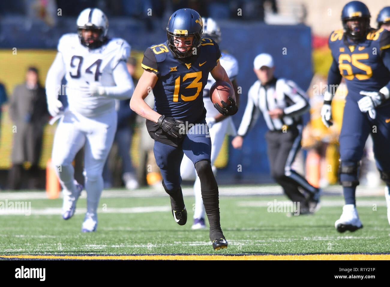Morgantown, West Virginia, USA. 10th Nov, 2018. West Virginia Mountaineers wide receiver DAVID SILLS V (13) runs with the ball after a catch during the Big 12 football game played at Mountaineer Field in Morgantown, WV. #9 WVU beat TCU 47-10 Credit: Ken Inness/ZUMA Wire/Alamy Live News Stock Photo