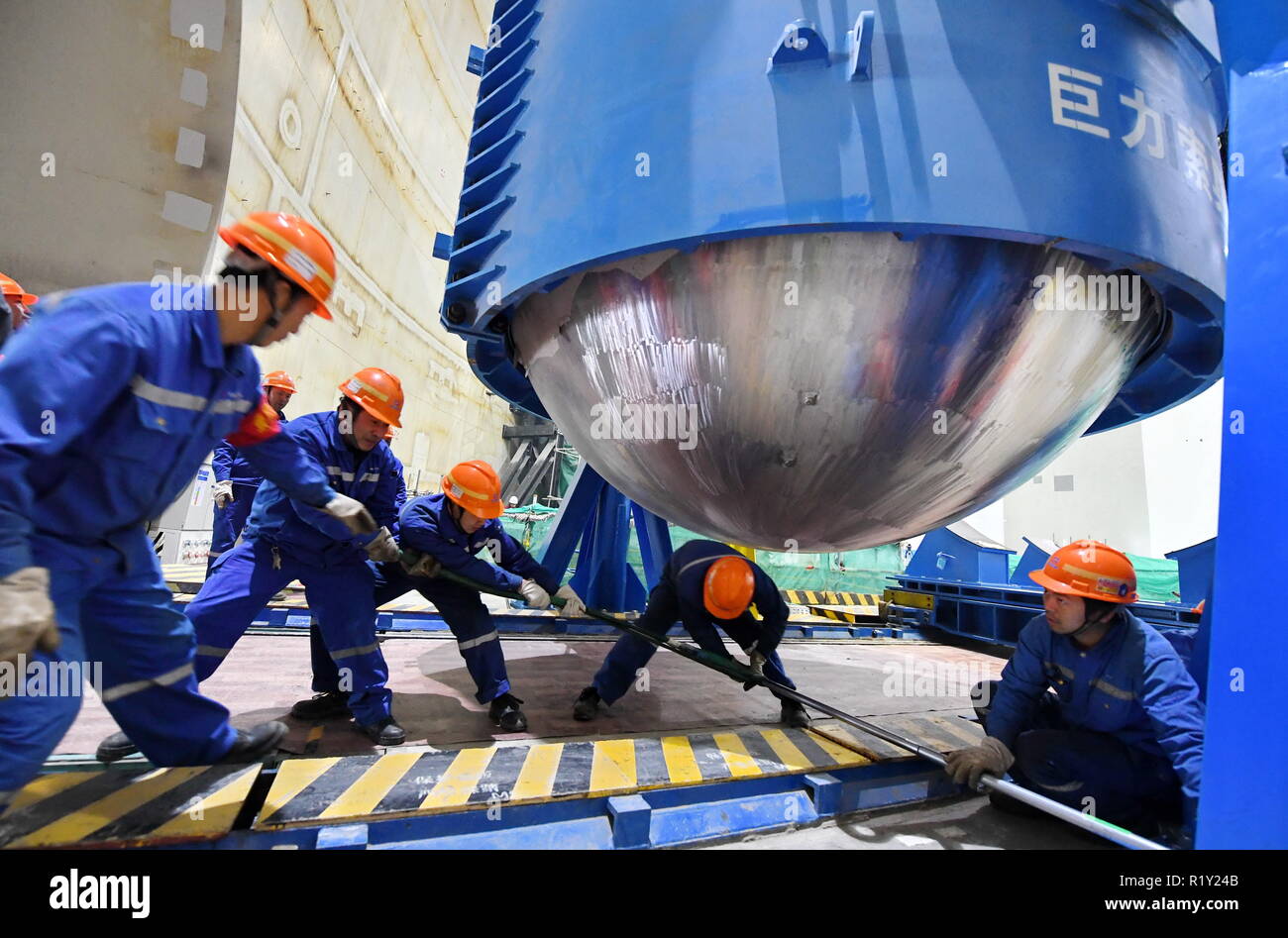 (181115) -- BEIJING, Nov. 15, 2018 (Xinhua) -- Workers are seen at the installation site of reactor pressure vessel (RPV) of the No.5 unit of China National Nuclear Corporation's Fuqing nuclear power plant in southeast China's Fujian Province, Jan. 28, 2018. According to the National Bureau of Statistics, China's power generation rose 7.2 percent year-on-year in the first 10 months of 2018. In October alone, China generated 533 billion kilowatt-hours (kWh) of power, up 4.8 percent year on year, faster than the 4.6-percent growth in September. The average daily power generation reached 17.2 bil Stock Photo