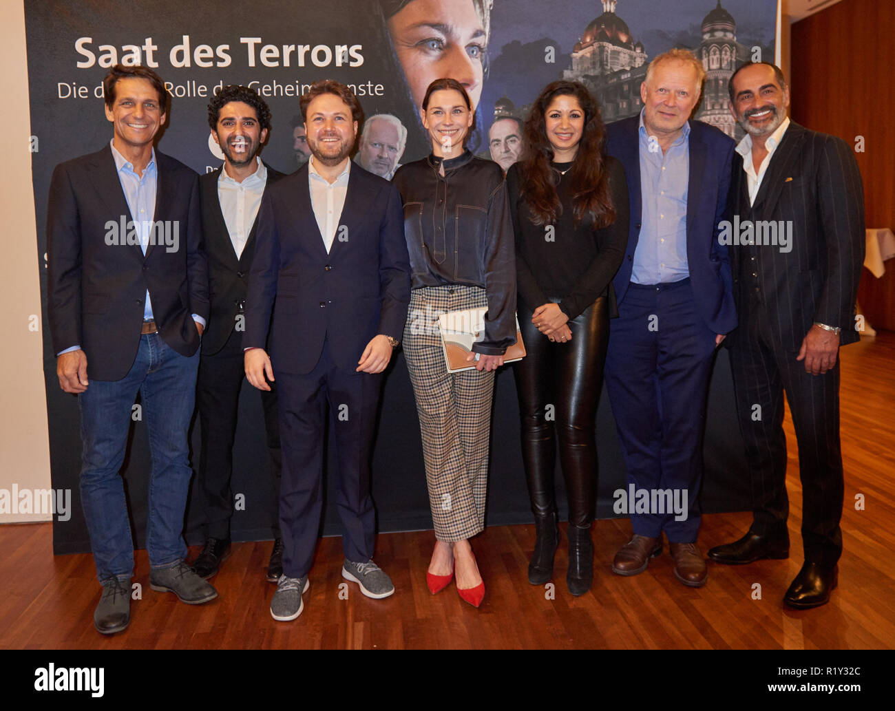 Berlin, Germany. 14th Nov, 2018. Robert Seeliger, actor, Reza Brojerdi, actor, Daniel Harrich, director, Christiane Paul, actress, Ankita Makwana, actress, Axel Milberg actor, Navid Negahban, actor (l-r) at the photocall for the 'Preview aat des Terrors'. Credit: Annette Riedl/dpa/Alamy Live News Stock Photo