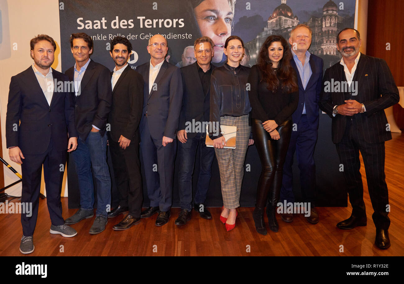 Berlin, Germany. 14th Nov, 2018. Daniel Harrich, director, Robert Seeliger, actor, Reza Brojerdi, actor, Manfred Hattendorf, film producer, Thomas Reutter, television journalist, Christiane Paul, actress, Ankita Makwana, actress, Axel Milberg actor, Navid Negahban, actor (l-r) at the photocall for the 'Preview aat des Terrors'. Credit: Annette Riedl/dpa/Alamy Live News Stock Photo