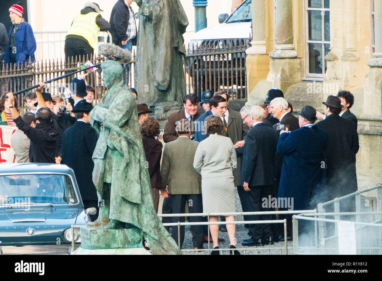 Aberystwyth, Wales, UK, 15th November 2018. Cast and crew on set of the award winning series ‘The Crown’ , filming the scene of the arrival of Prince Charles at Aberystwyth university in 1969 on the eve of his investiture as Prince of Wales later that year in Caernarfon Castle.  Actor Josh O’Connor, playing the part of the Prince in series three and four, is best known for his portrayal of  Johnny Saxby in the film God’s Own Country, for which he won a British Independent Film Award for Best Actor. Credit: Keith Morris/Alamy Live News Stock Photo