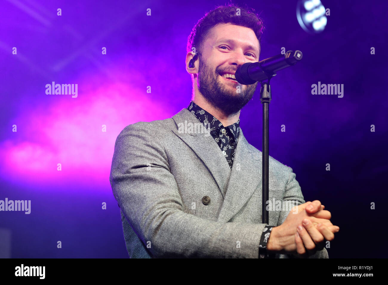 Regent Street, London, UK, 15th Nov 2018. British superstar Calum Scott  performs on stage to a cheering audience. The official 'switch-on' of the  largest lights installation in the capital, Regent Street's 'The