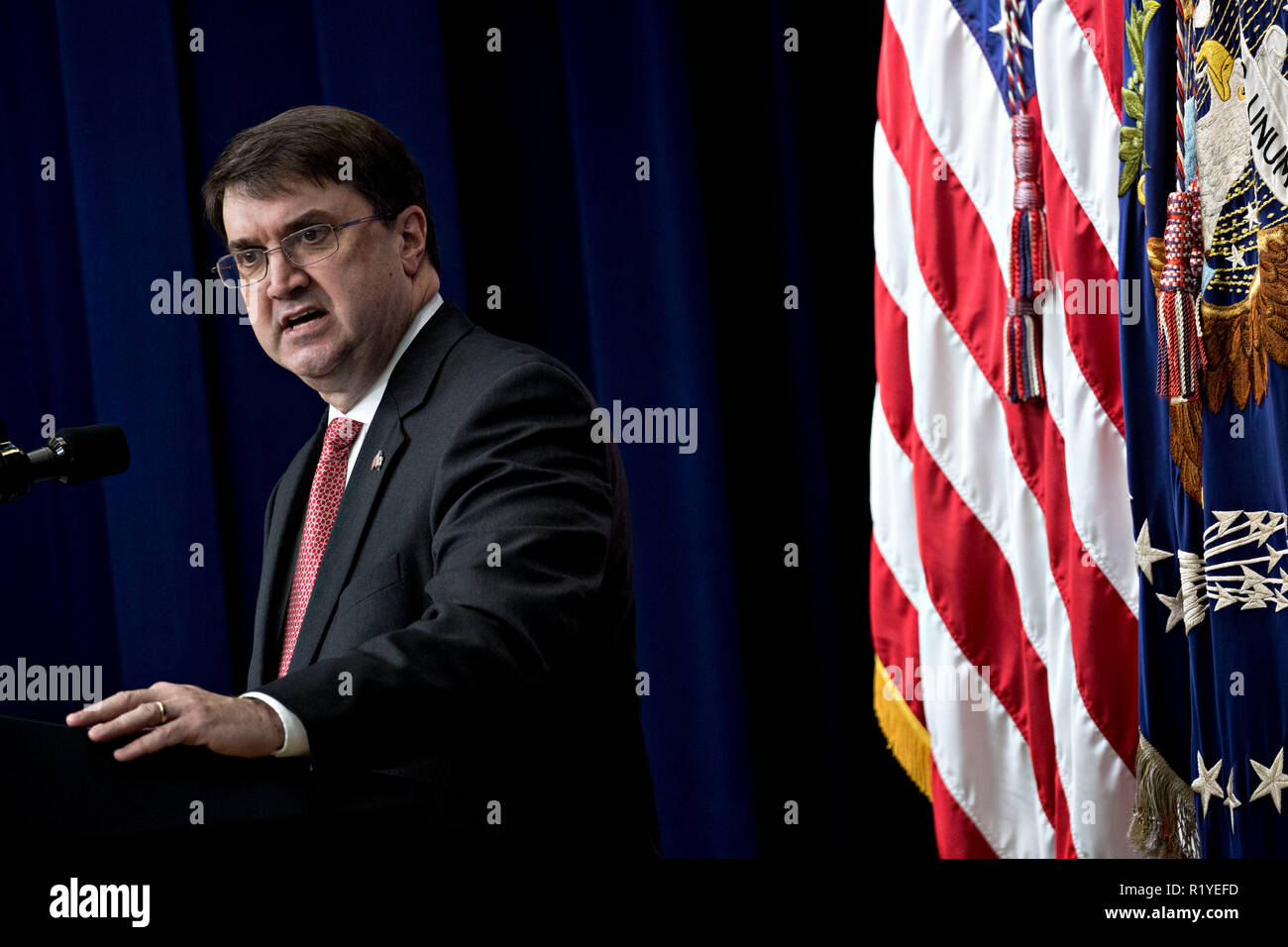 United States Secretary of Veterans Affairs (VA) Robert Wilkie speaks during an event supporting veterans and military families in the Eisenhower Executive Office Building in Washington, D.C., U.S., on Thursday, Nov. 15, 2018. US President Donald J. Trump today accused Robert Mueller of 'threatening' witnesses to cooperate in the probe into Russian meddling in the U.S. presidential election, one day after the Senate's Republican leader blocked a bid to protect the special counsel's work.  Credit: Andrew Harrer / Pool via CNP | usage worldwide Stock Photo
