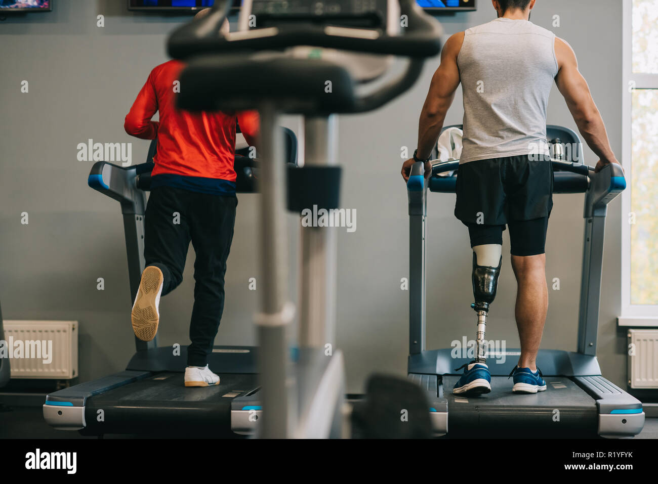 Treadmill Rear View Rear view man prosthetic leg hi-res stock photography and images - Alamy