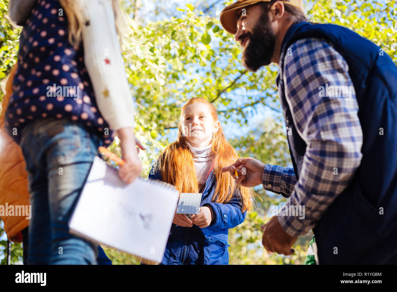 Joyful nice children interacting with each other Stock Photo