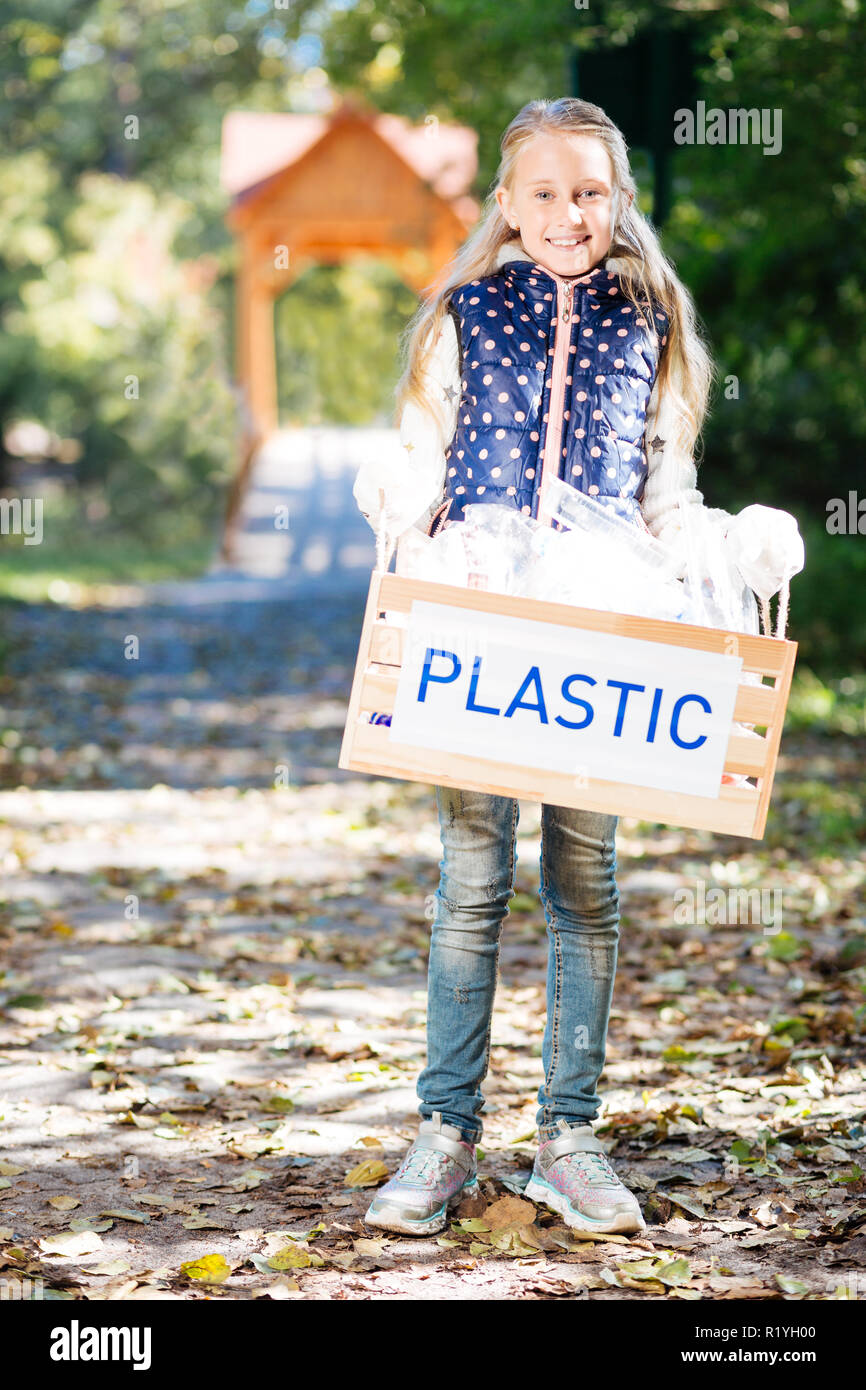 Cute pretty girl standing on the forest path Stock Photo - Alamy