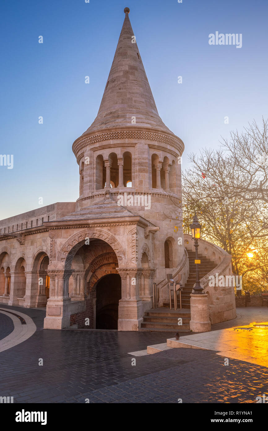 Budapest, Hungary - Sunrise at the entrance tower of the Fisherman's Bastion (Halaszbastya) at autumn with clear blue sky Stock Photo