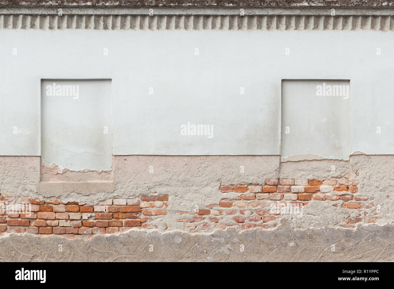 False windows on light green wall Stock Photo