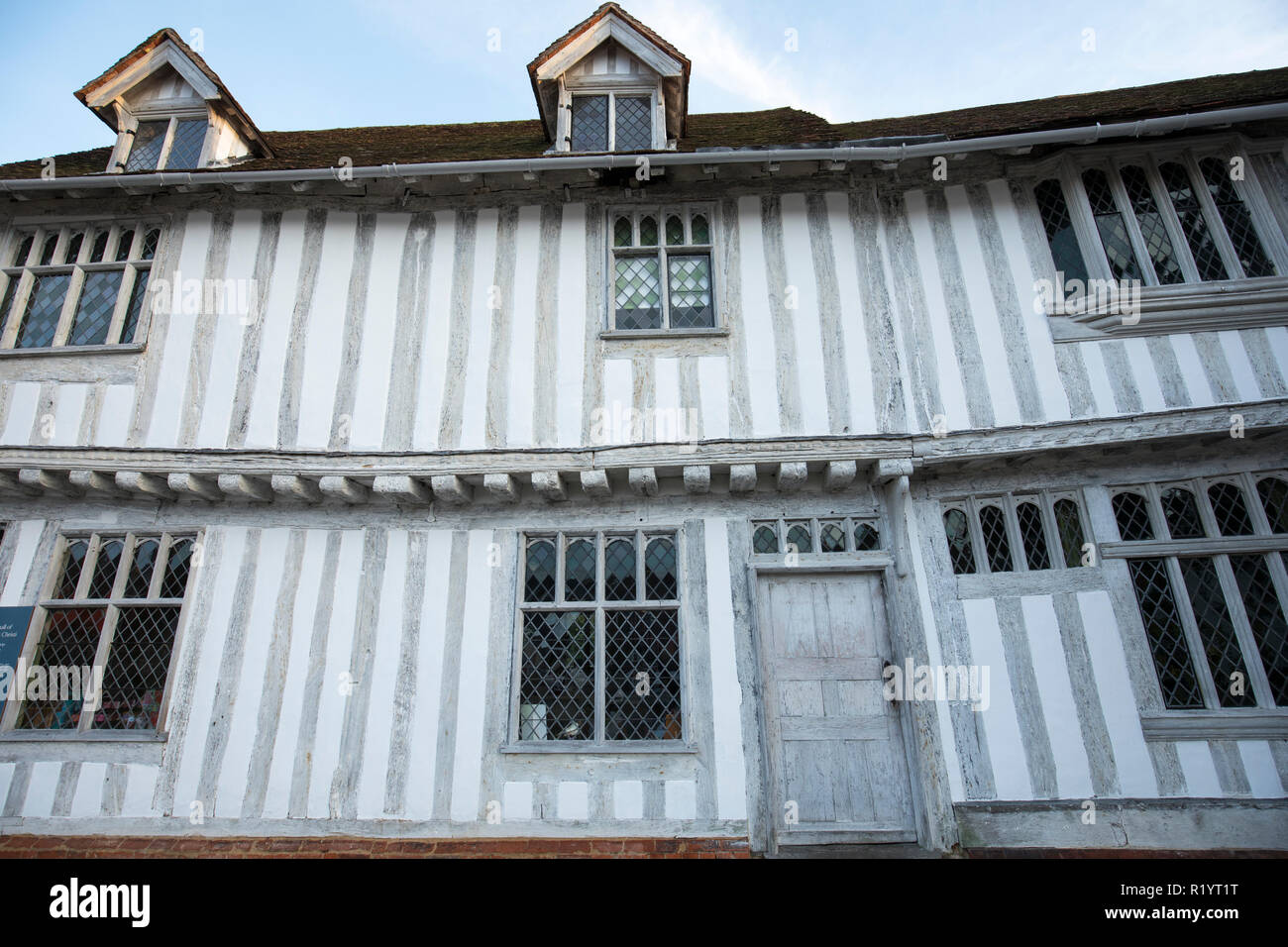 Ancient architecture of Guildhall of Corpus Christi, Grade I listed timber-framed property with leaded light windows in quaint historic town of Lavenh Stock Photo