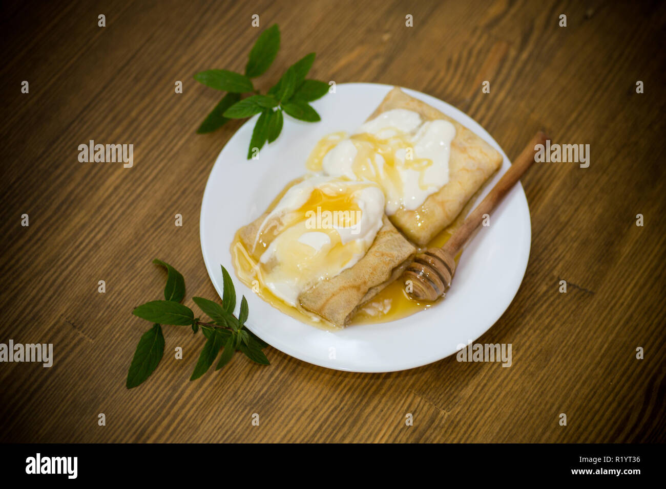 Sweet Pancakes With Cottage Cheese Sour Cream And Honey In A