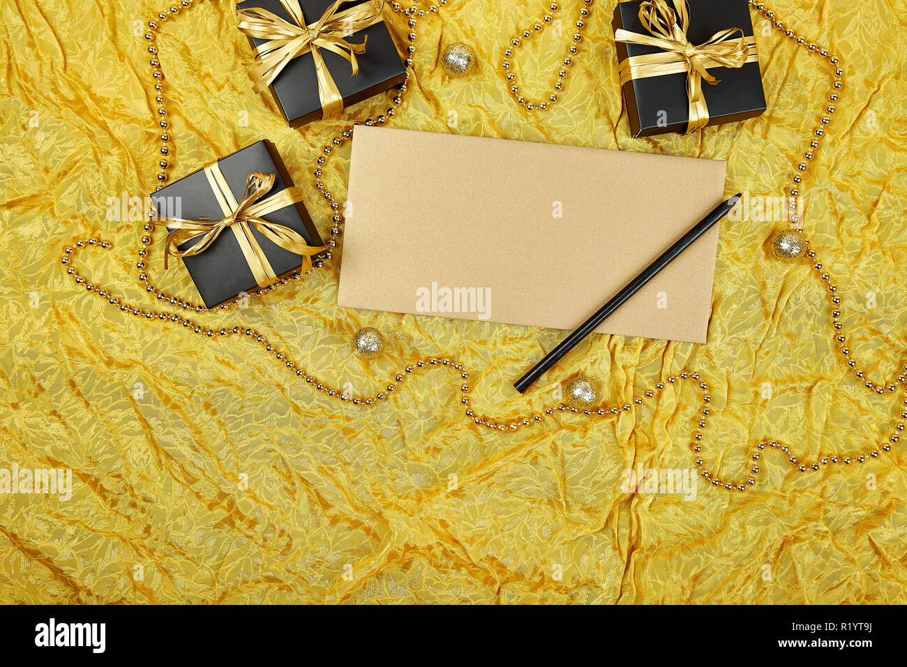Pile Of Handmade Luxury Black Gift Boxes With Gold Ribbon Diy