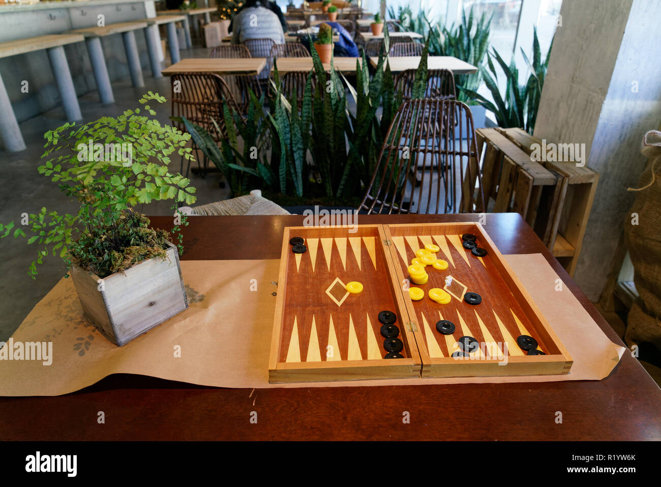 A backgammon game awaited players at a Greek cafe in the Tribeca