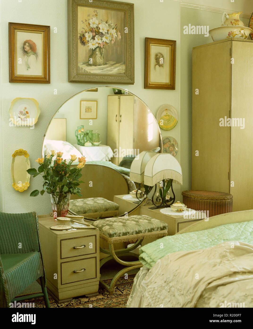 Thirties style dressing table with circular mirror in dated bedroom Stock  Photo - Alamy