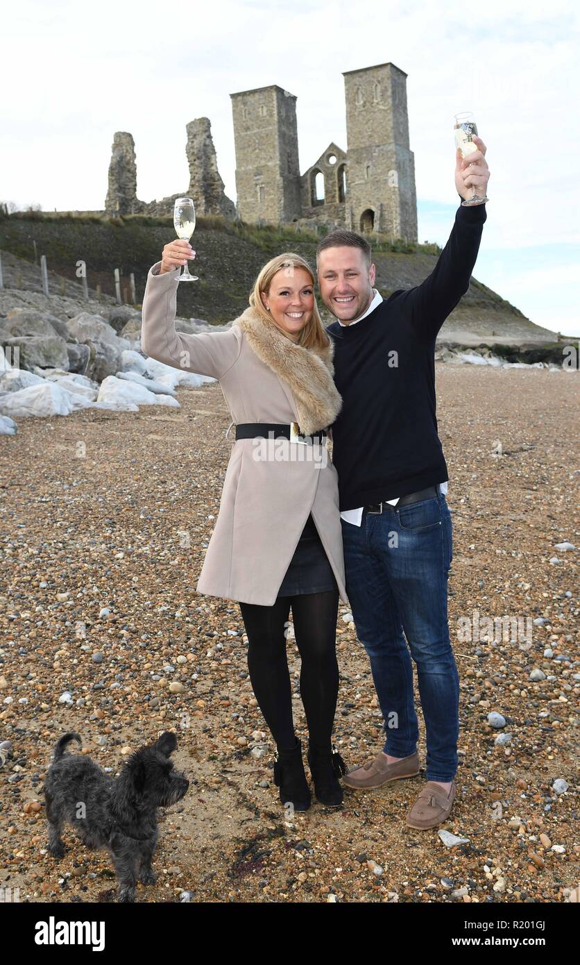 Mick Tyler, 35, and his fiancee Sarah Harmer, 33, winners of the One Million Pound Lotto Raffle, pictured on the beach where Mick proposed to Sarah last Christmas Eve, at Reculver in Kent.  Featuring: Mick Tyler, Sarah Harmer Where: Reculver, Kent, United Kingdom When: 12 Oct 2018 Credit: Steve Finn/WENN Stock Photo