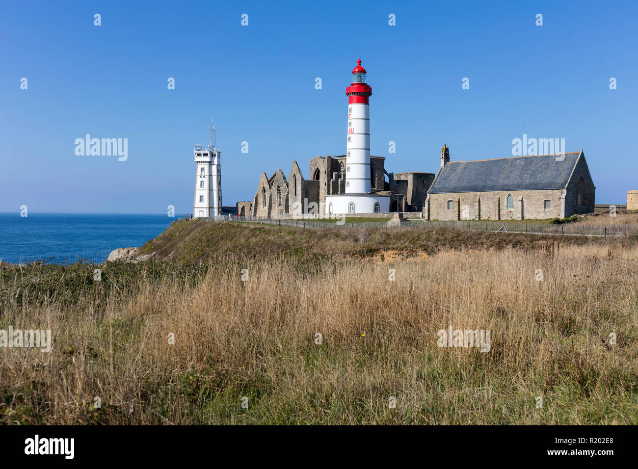 St Mathieu Lighthouse, coastguard station,  and abbey ruins Stock Photo