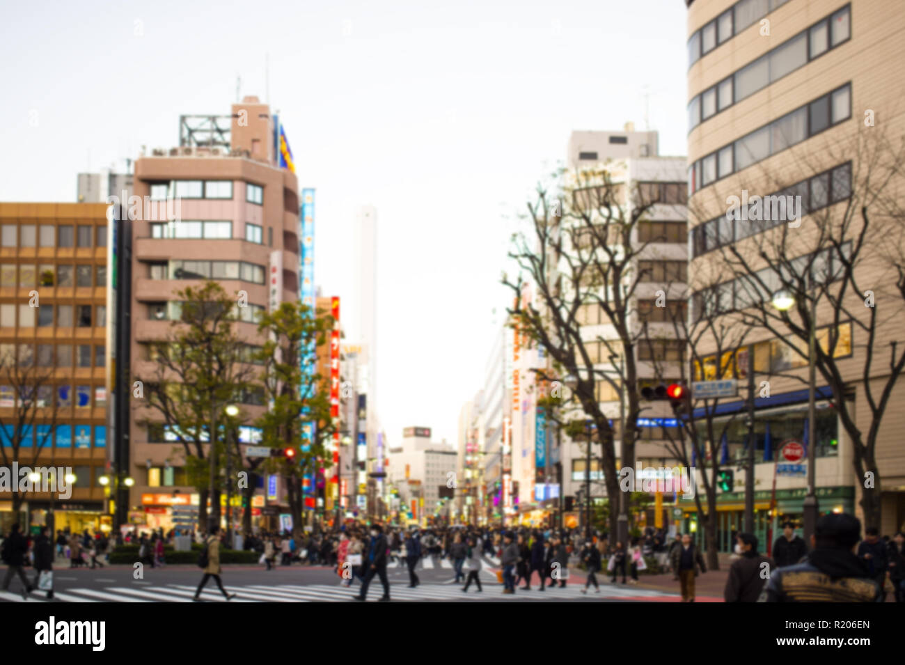 Blurred picture. People are crossing one of Japan's busiest crossroads in Shinjuko district at night. Shinjuku is a special ward in Tokyo, Japan. Stock Photo