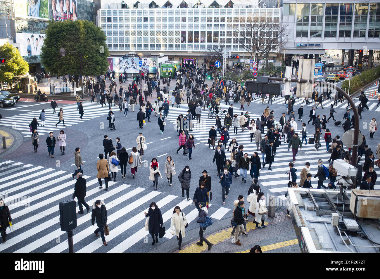 TOKYO - JAPAN - 10 DECEMBER 2017. People are crossing one of Japan's busiest crossroads in Shinjuko district. Shinjuku is a special ward in Tokyo Stock Photo