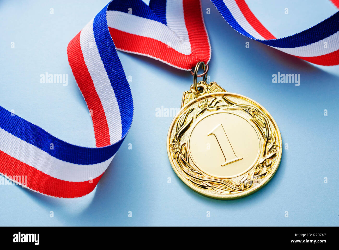 Gold medal 1 place with a ribbon Stock Photo