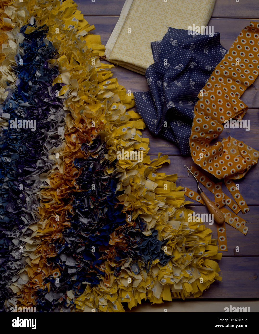 Closeup of yellow and blue rag rug Stock Photo Alamy