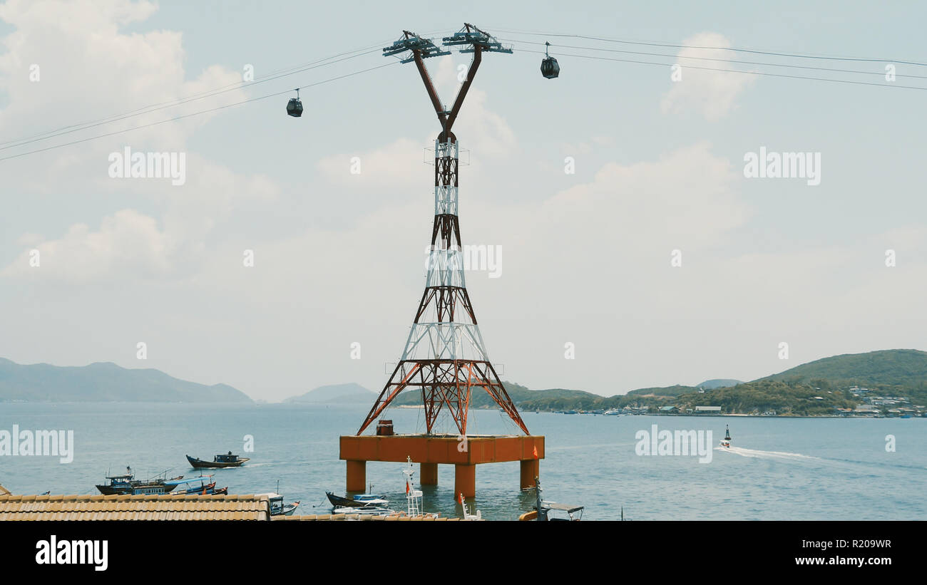 Cable car to Vinpearl amusement park in the morning sunshine to attract tourists to the weekend relaxing in Nha Trang, Vietnam Stock Photo