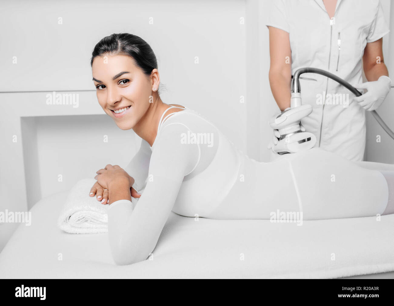 Beautiful woman receiving lpg massage against cellulite Stock Photo Alamy