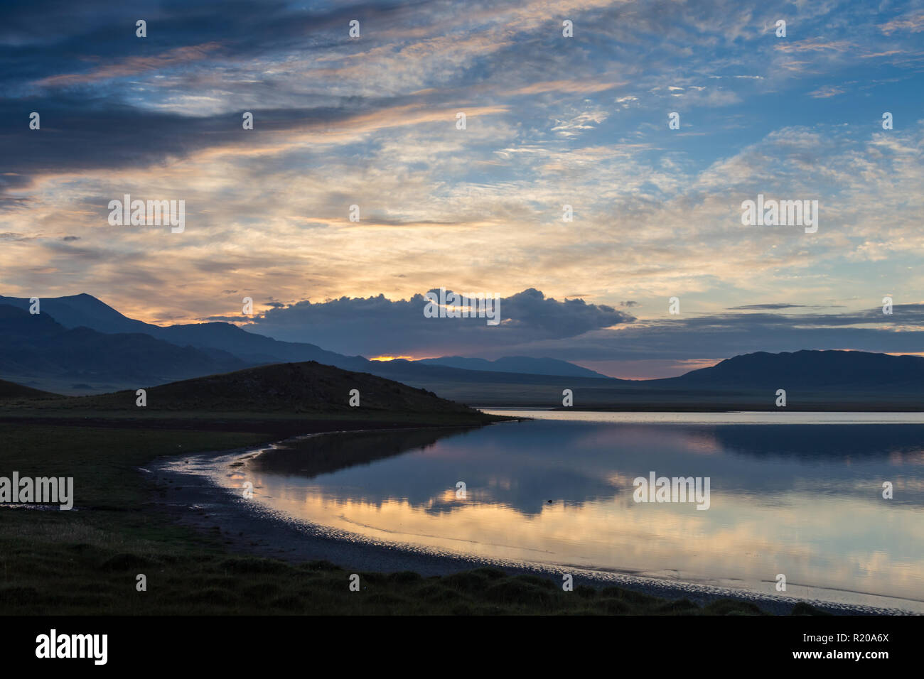 Sky reflecting in a lake Stock Photo - Alamy