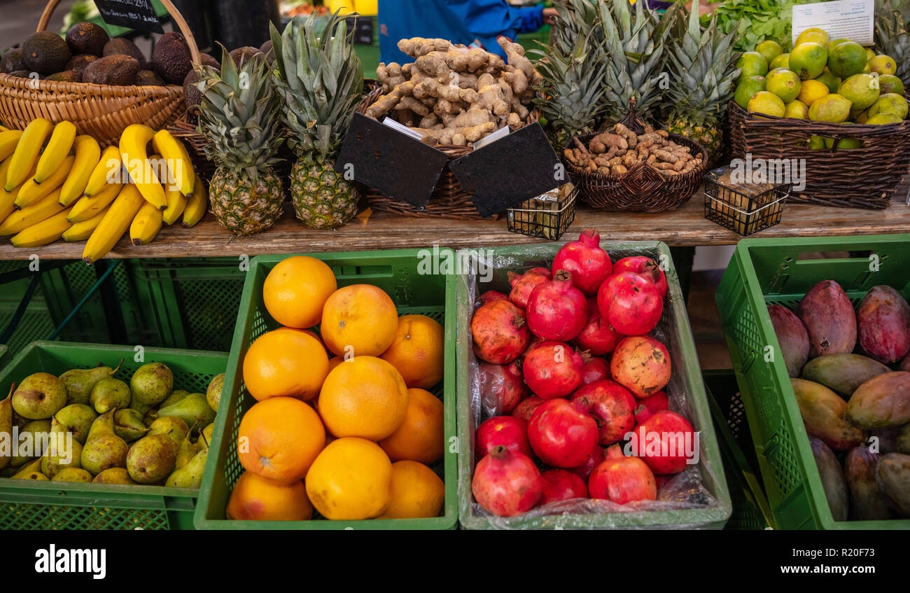 Colorful display of various fruits in a local market in Berlin Germany, wallpaper Stock Photo