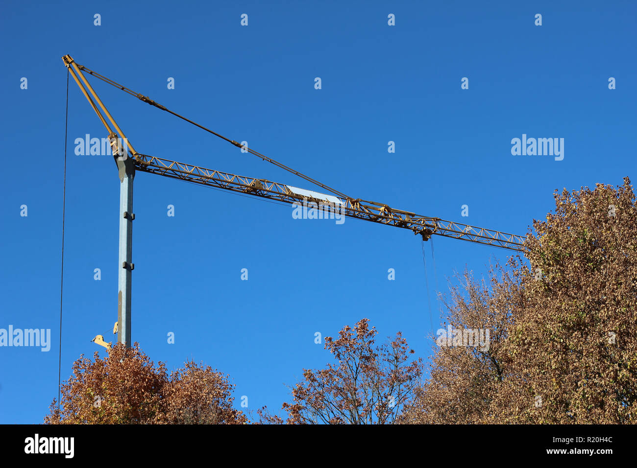 Crane. Crane on a blue sky background Stock Photo - Alamy