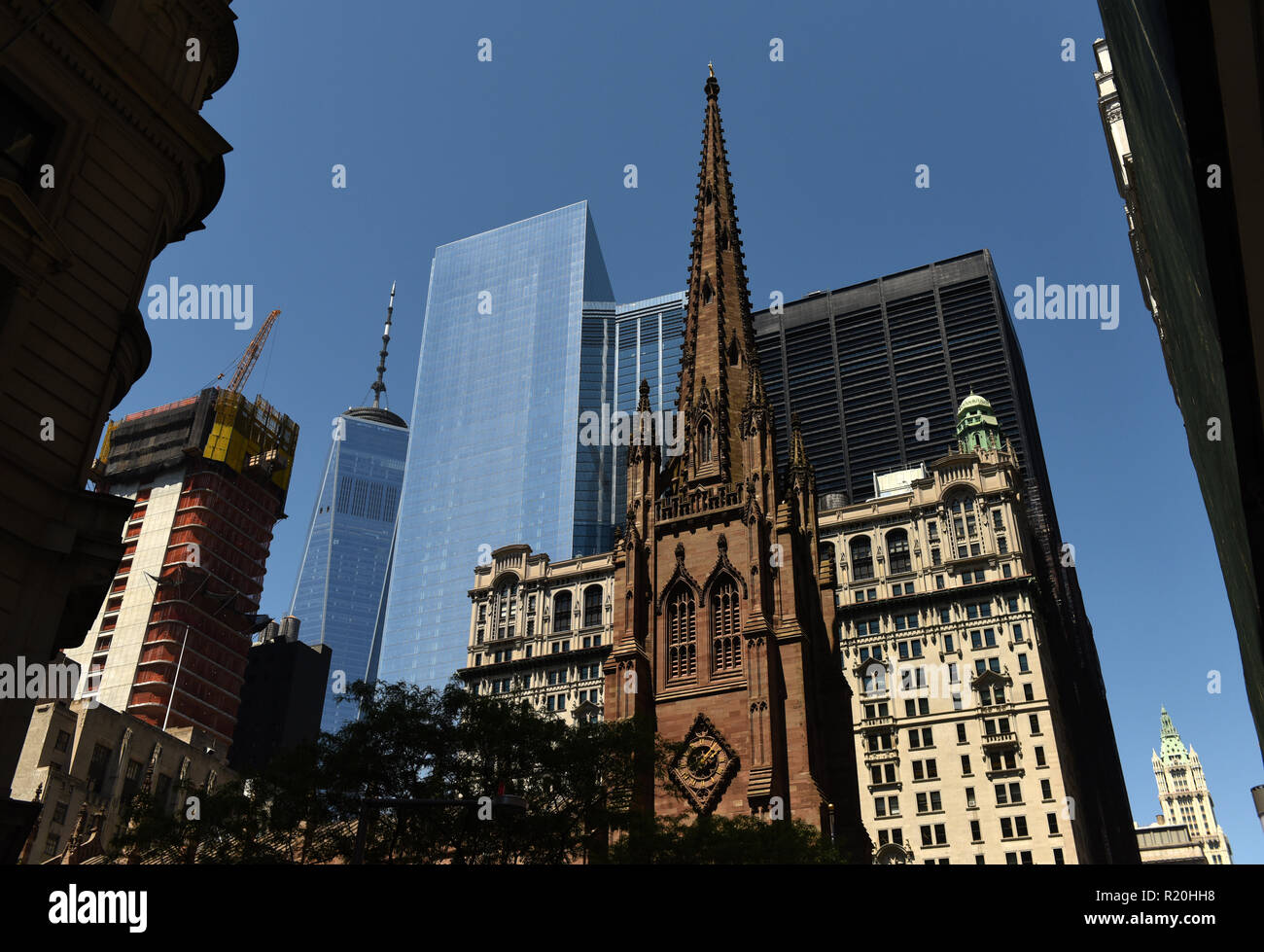New York cityscape with Trinity Church in lower Manhattan Stock Photo