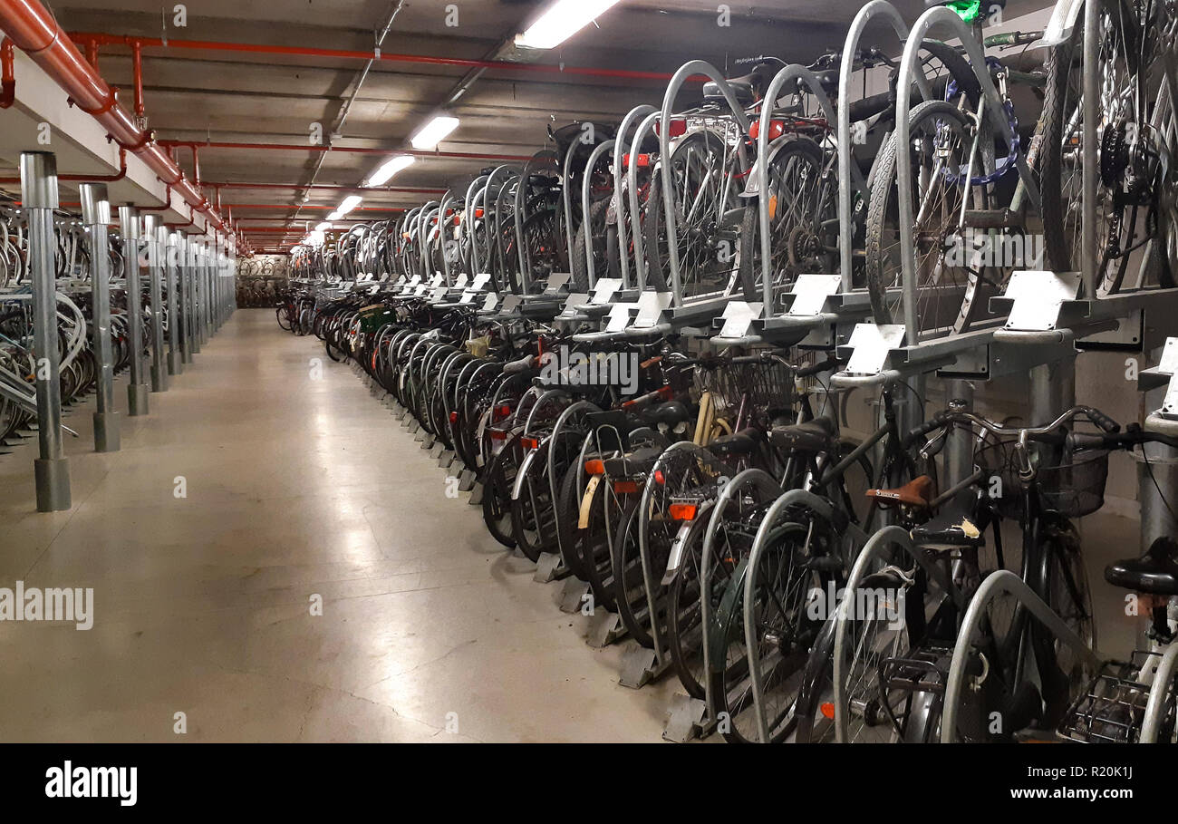 Underground parking for bicycles in the center of Florence, Italy. Stock Photo