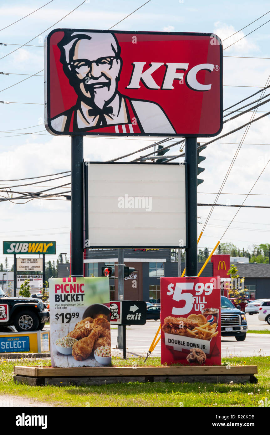 A roadside advertising sign for KFC, Kentucky Fried Chicken on Airport Boulevard in Gander, Newfoundland. Stock Photo