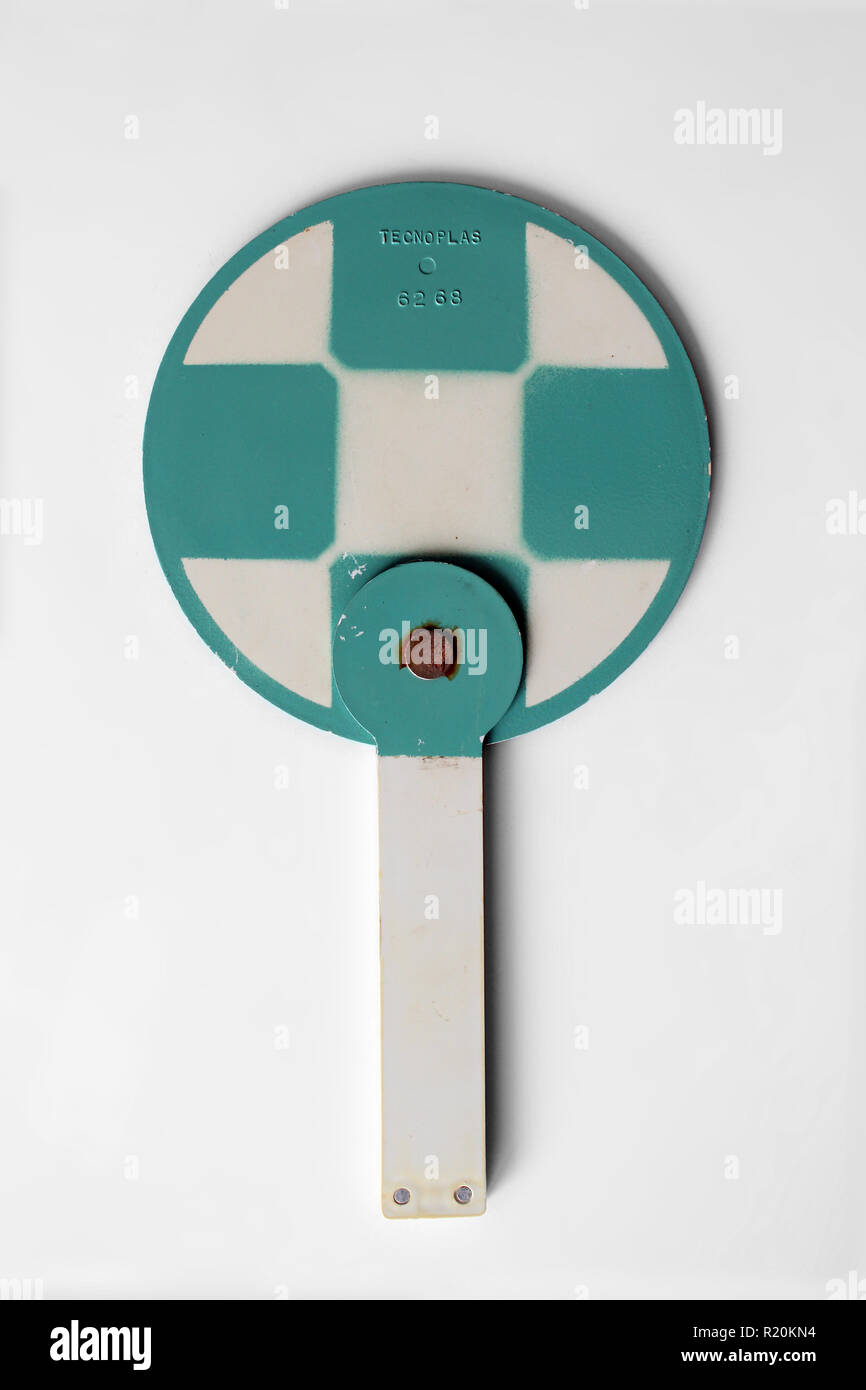 Cardboard plastic hand fan isolated on a white background Stock Photo