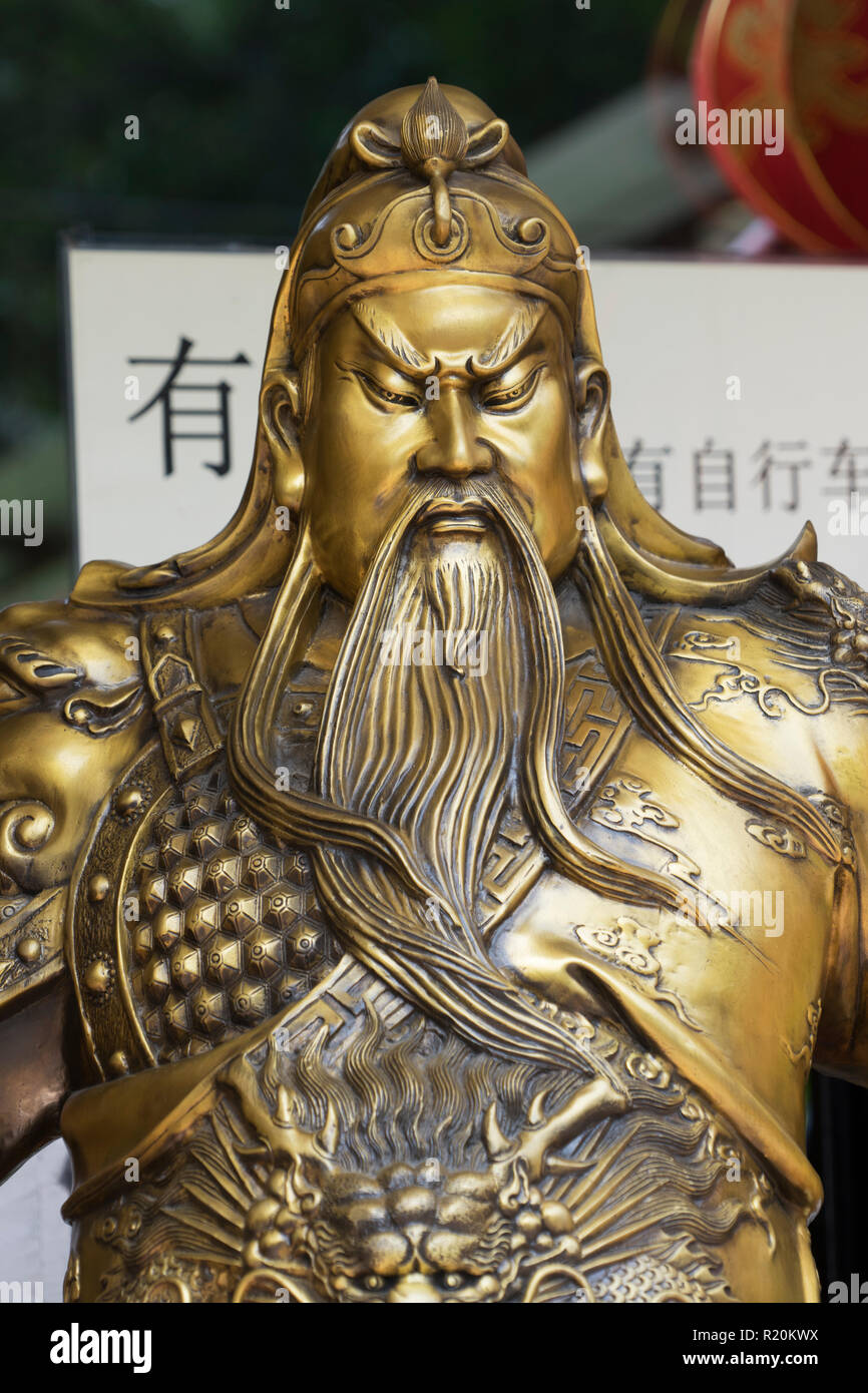 Closeup of a bronze sculpture of the ancient Chinese Guan