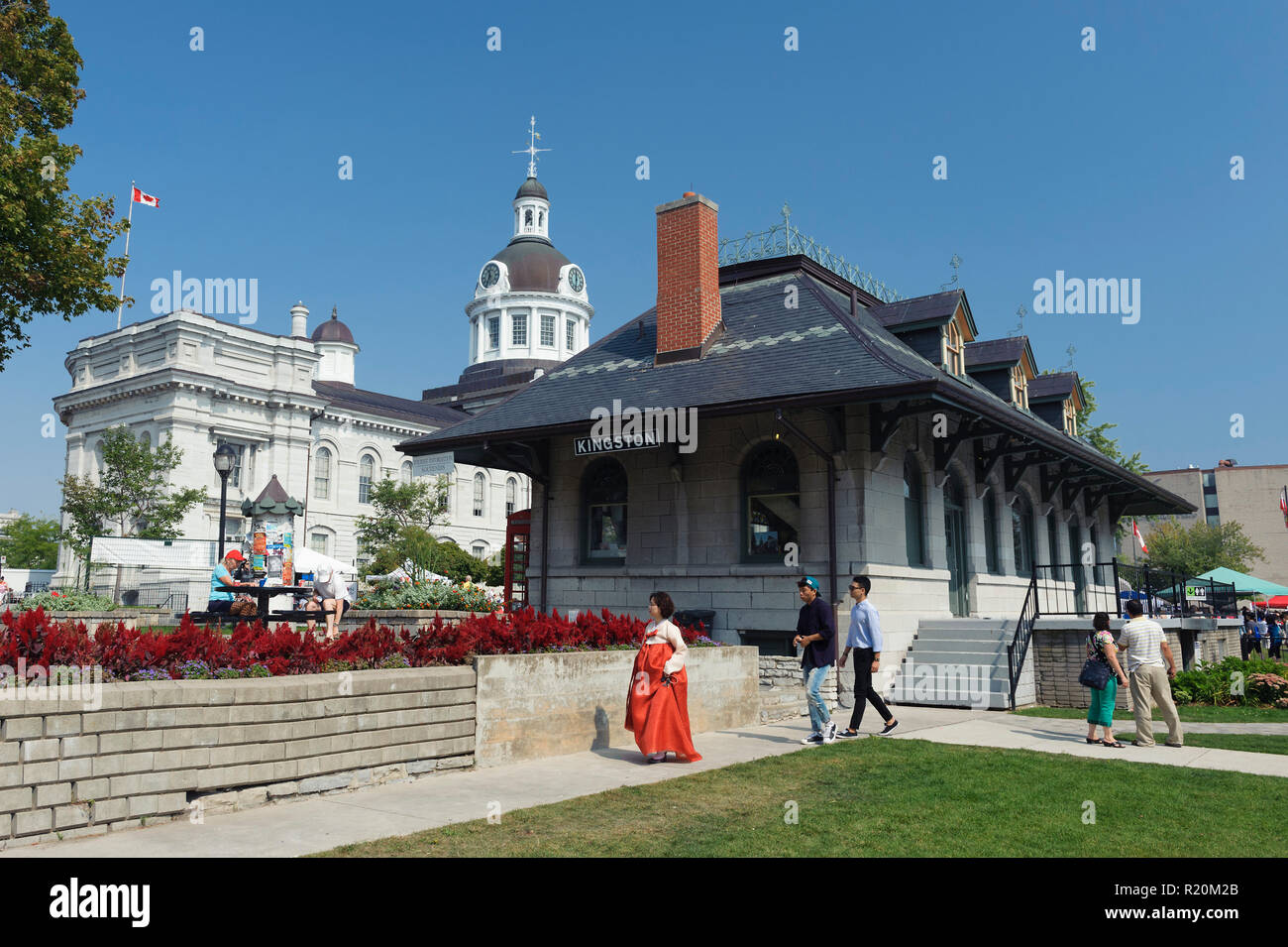 Kingston tourist information center, located in an old train station, and City Hall in the background. Ontario, Canada. Stock Photo