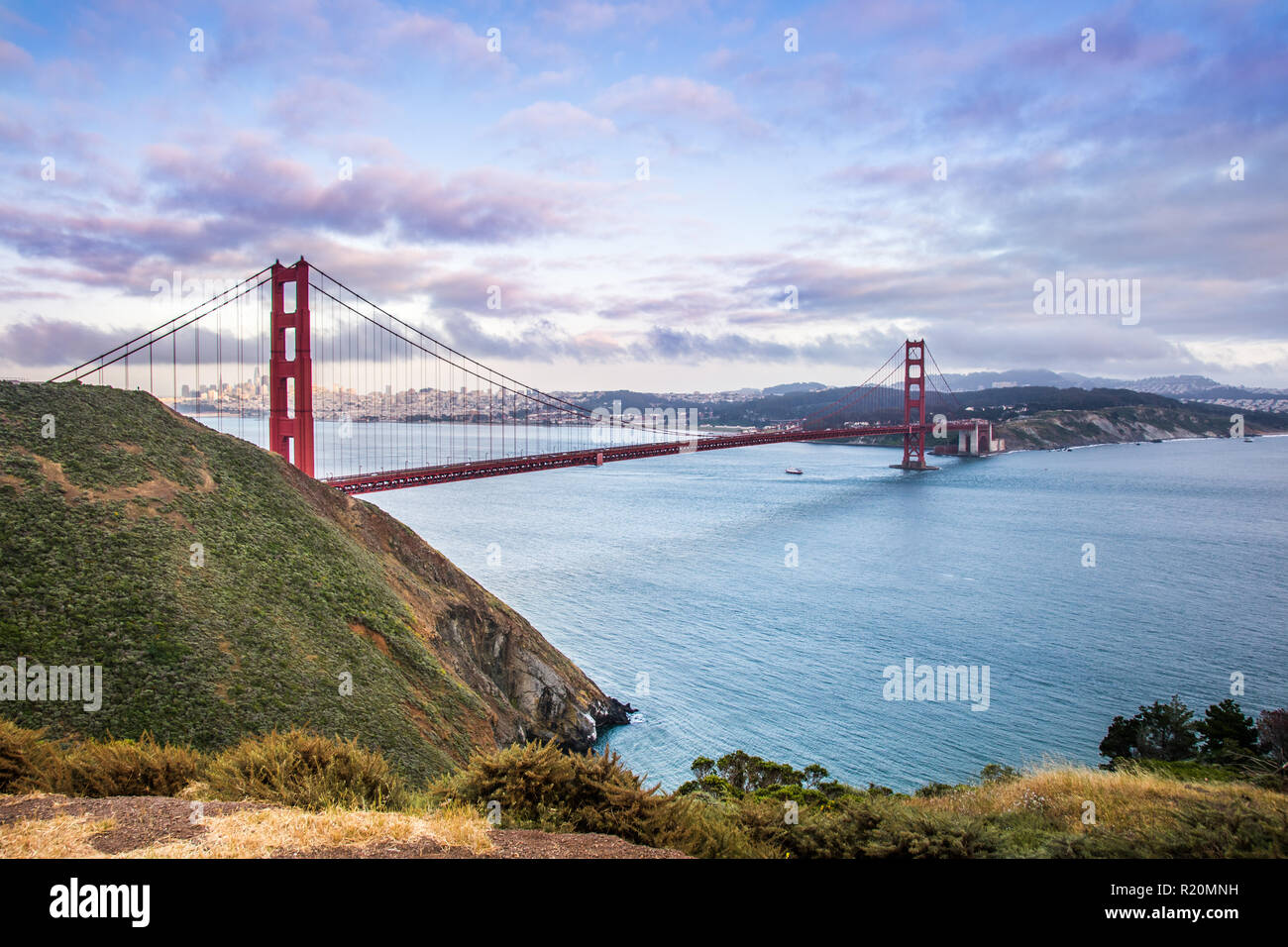 Panoramic view of Golden Gate Bridge connecting San Francisco and Marin Headlands, on a cloudy afternoon Stock Photo