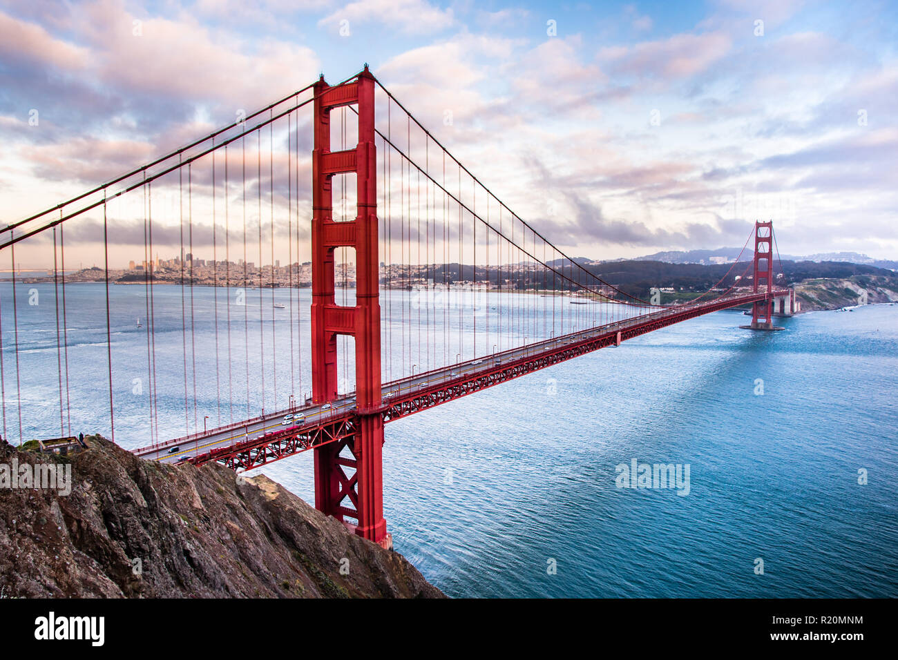 Panoramic view of Golden Gate Bridge connecting San Francisco and Marin Headlands, at sunset Stock Photo