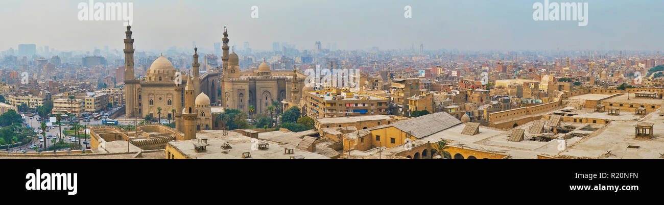 Watch the city panorama from the Saladin Citadel, the old urban neighborhoods surround the complex of Al Rifai' and Sulta Hassan mosques, Cairo, Egypt Stock Photo