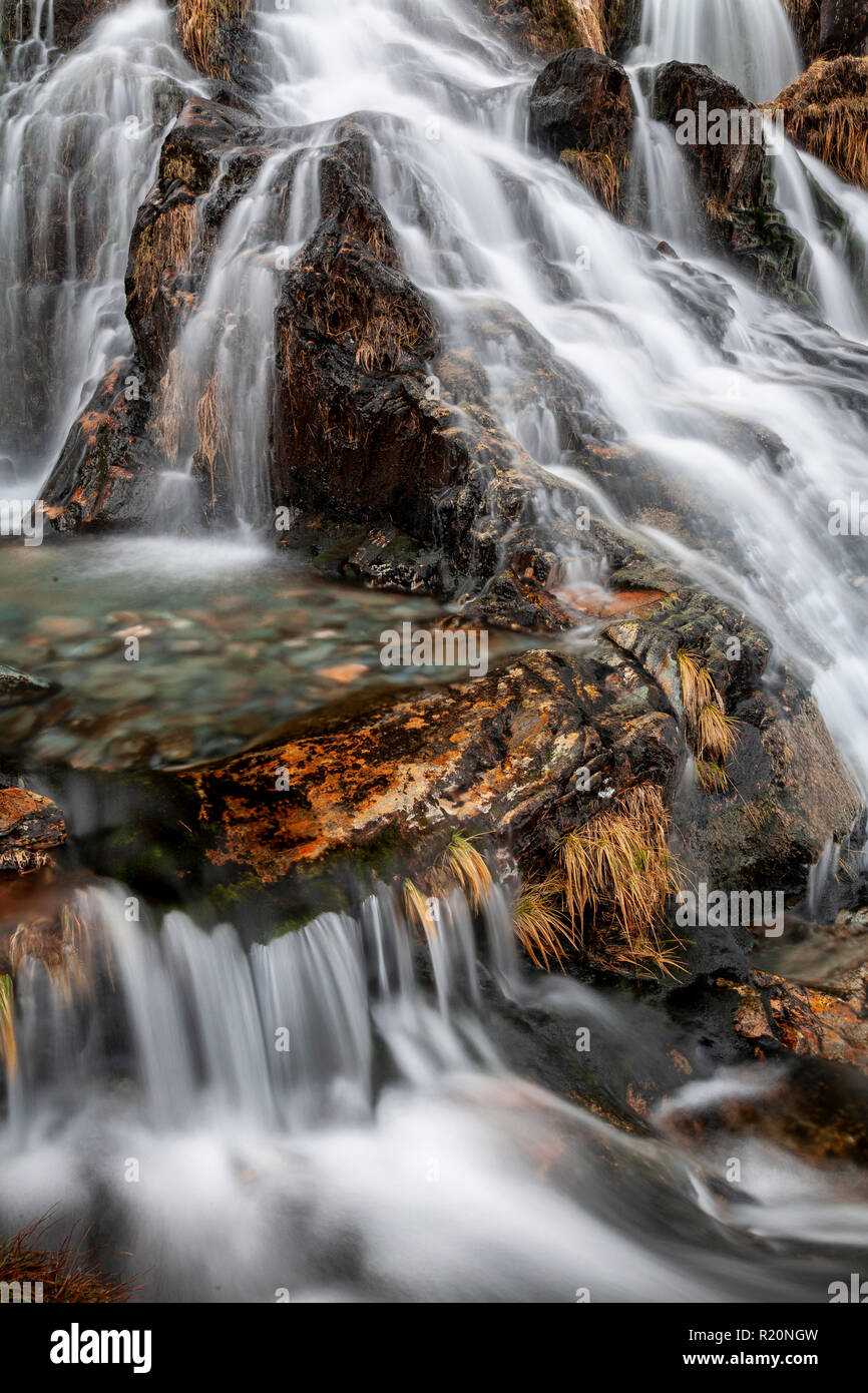Waterfall in a rocky stream in Snowdonia, North Wales Stock Photo