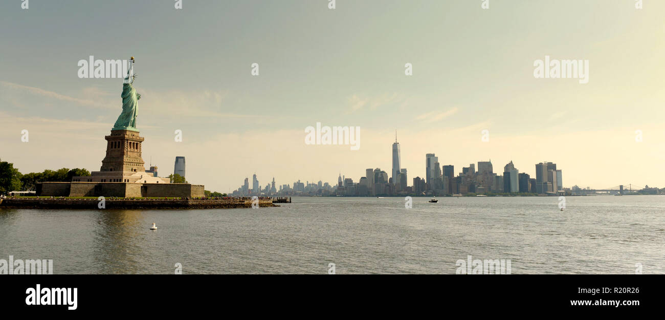 Statue of Liberty and financial district in lower Manhattan, New York City, NY, USA. Stock Photo