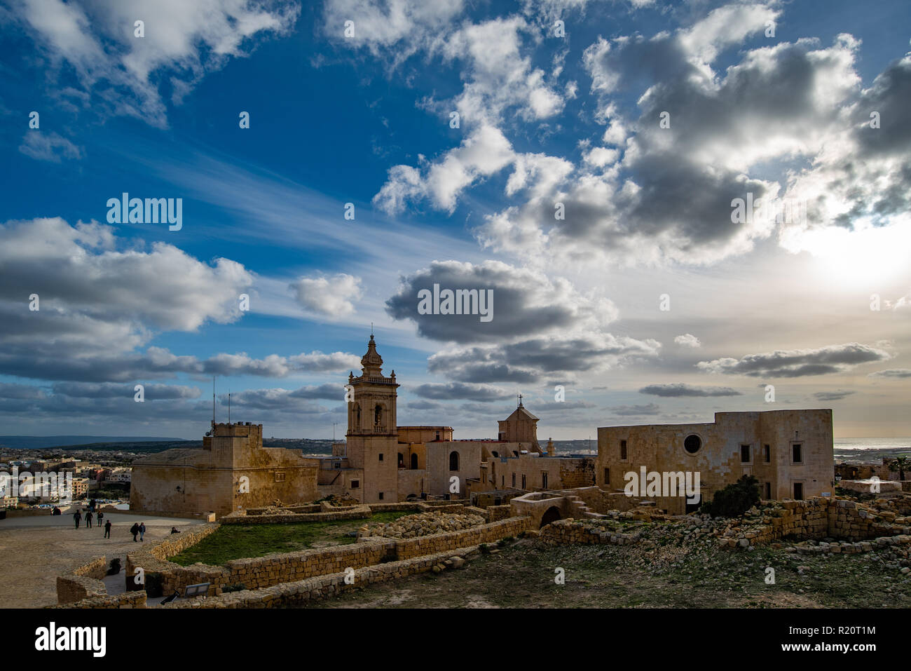 Gozo's Citadel, its highest point silhouetted against a dramatic cloudy sky Stock Photo