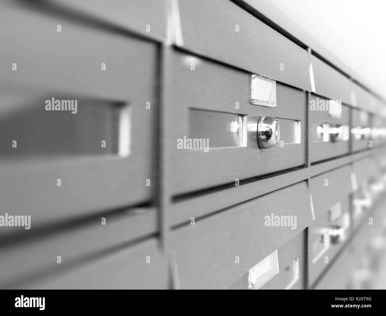 Aluminum mail boxes. Ideal for concepts such as safety and security, business communication and more. Shallow DOF. Stock Photo