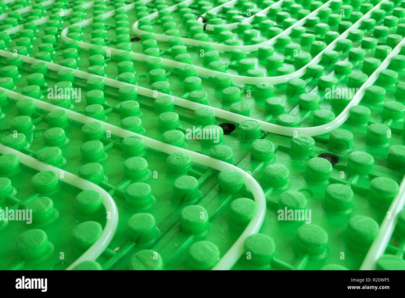 Floor heating system hydro installation with pipes, close up Stock