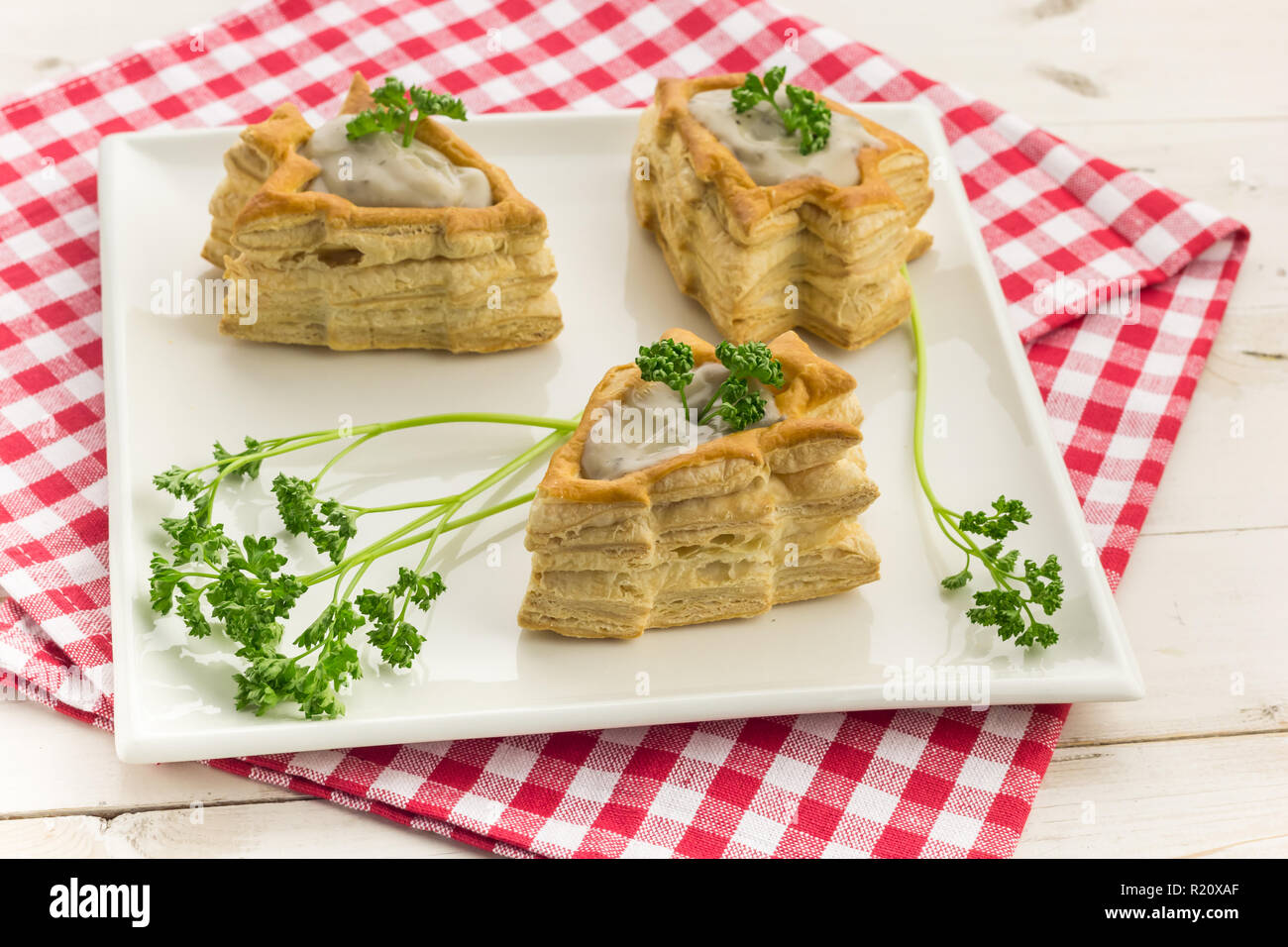 Vol Au Vents Shaped Like A Christmas Tree Filled With Mushroom Ragout And Topped With Fresh Parsley Stock Photo Alamy
