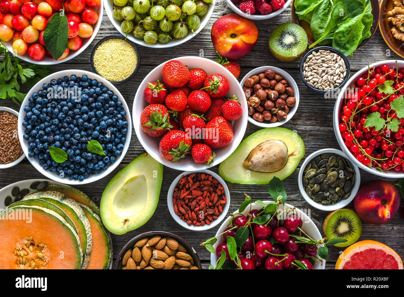 Healthy food background. Table with breakfast in a bowls, superfood