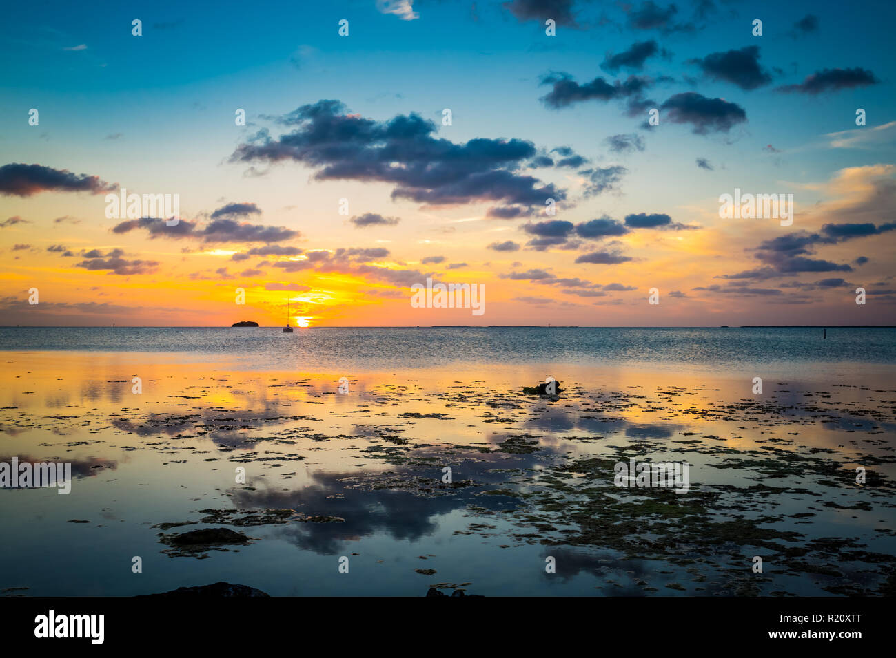 Sun slowly drops over key west water in Fl.jpg Stock Photo