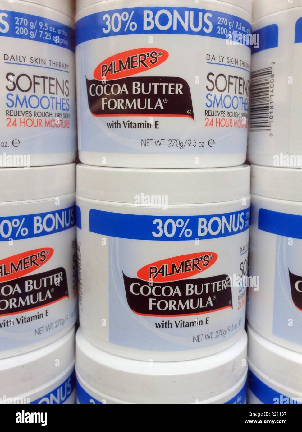 Cocoa butter with vitamin E for skin therapy displayed in beauty products shop, London Stock Photo