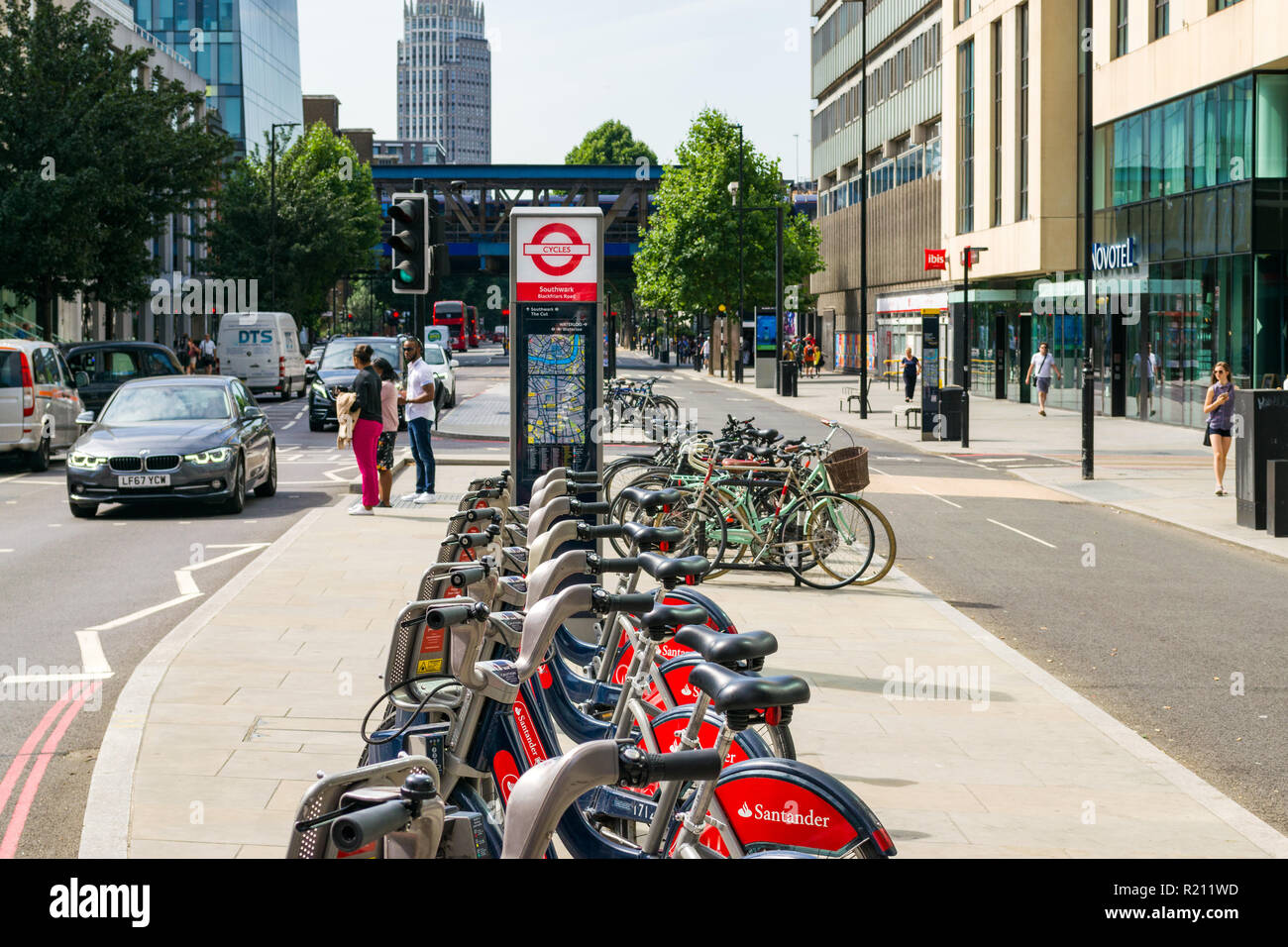 The CS6 cycle superhighway at Blackfriars road with a row of Santander Cycles parked on pavement, London, UK Stock Photo