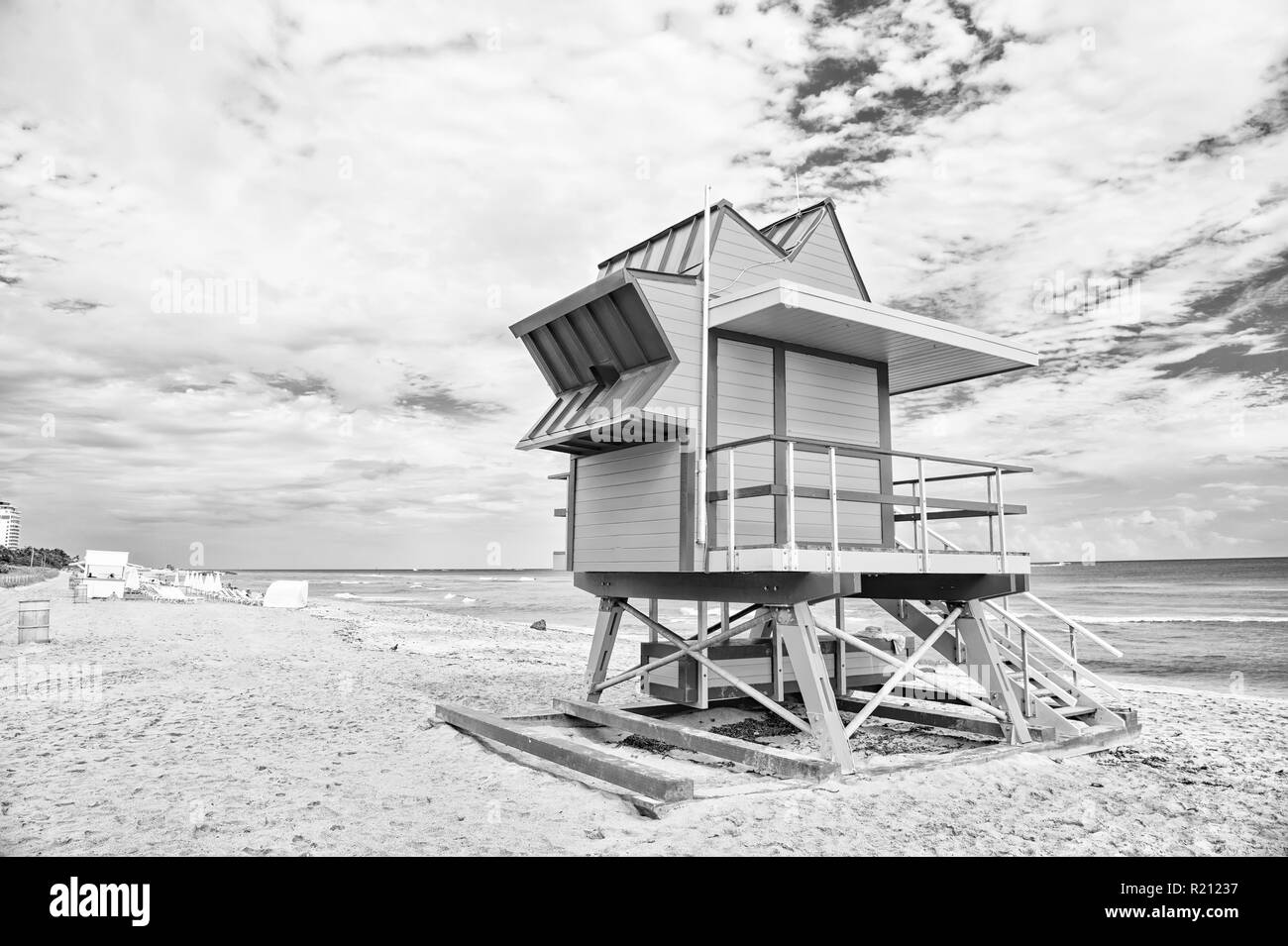 South Beach, Miami, Florida. lifeguard house in a colorful Art Deco style on cloudy blue sky at Miami South Beach and Atlantic Ocean in background, world famous travel location Stock Photo