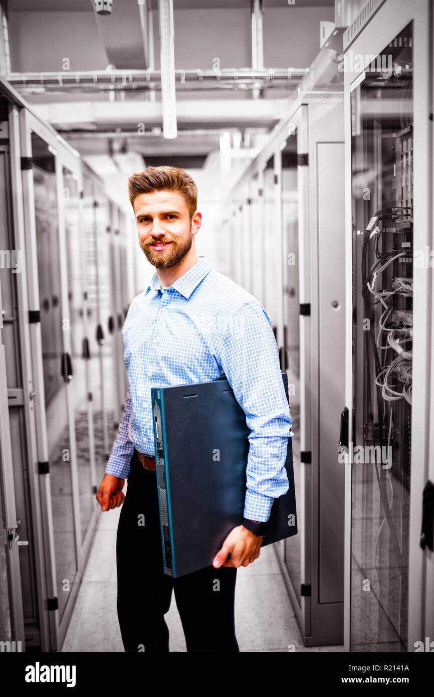 Technician holding a server Stock Photo - Alamy